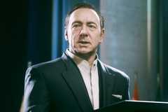 Kevin Spacey standing behind a podium in Call of Duty Advanced Warfare.